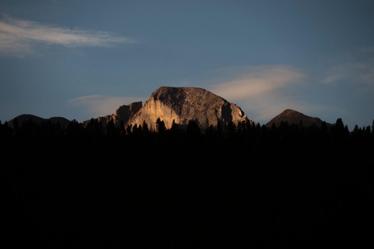 Morning sunlight reaches Longs Peak viewed from Moraine Park in Rocky Mountain National Park on Sept. 14, 2022.