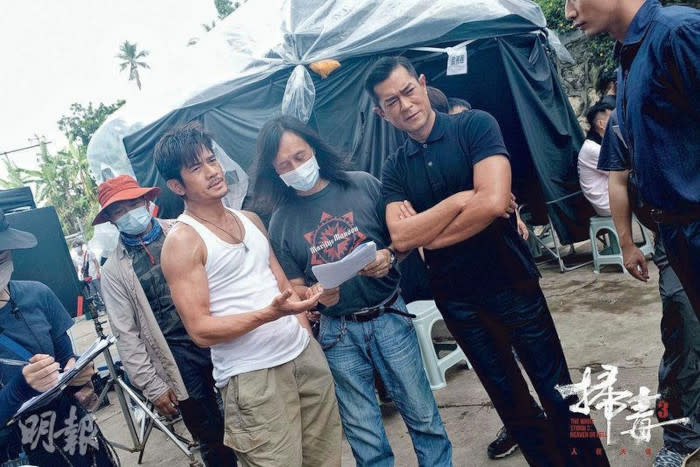 Herman on the set of 'The White Storm 3' alongside Aaron Kwok and Louis Koo