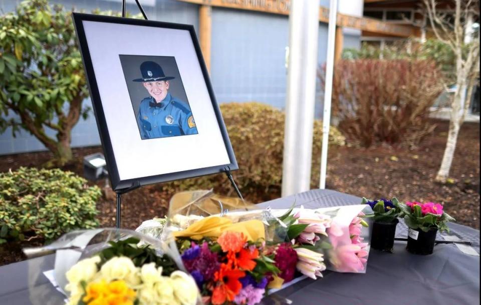 A memorial was set up for Washington State Patrol Trooper Christopher Gadd outside the State Patrol’s District 7 headquarters in Tulalip on Saturday, March 2, 2024. Gadd died after his vehicle was struck by a motorist on I-5.