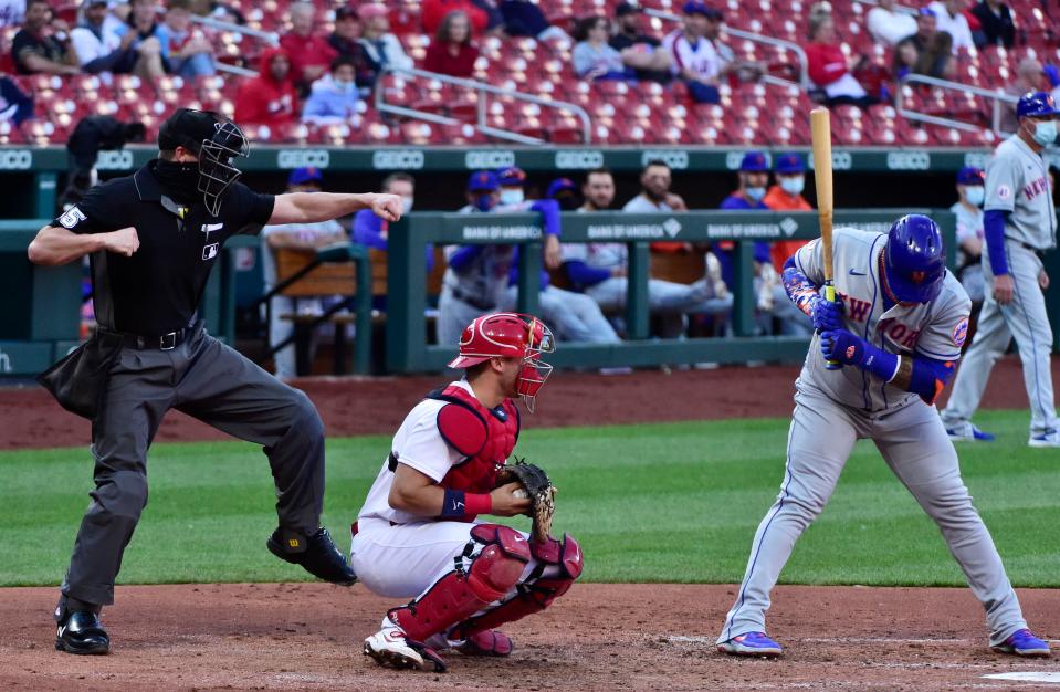 Mets' Jonathan Villar is called out on strikes by umpire Brennan Miller in Monday's game against the Cardinals.