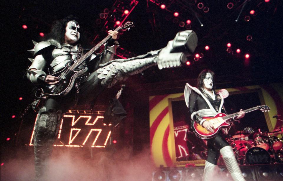 Kiss bassist Gene Simmons (left) and guitarist Ace Frehley perform during the band’s Psycho Circus World Tour concert for a sold-out crowd at the Nashville Arena on Jan. 2, 1999.