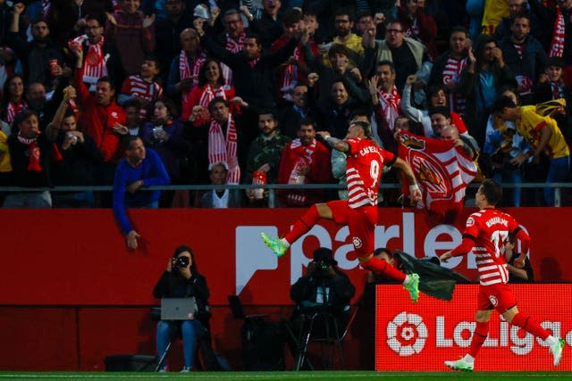 Taty Castellanos, centre, struck four times for Girona (Joan Monfort/AP)