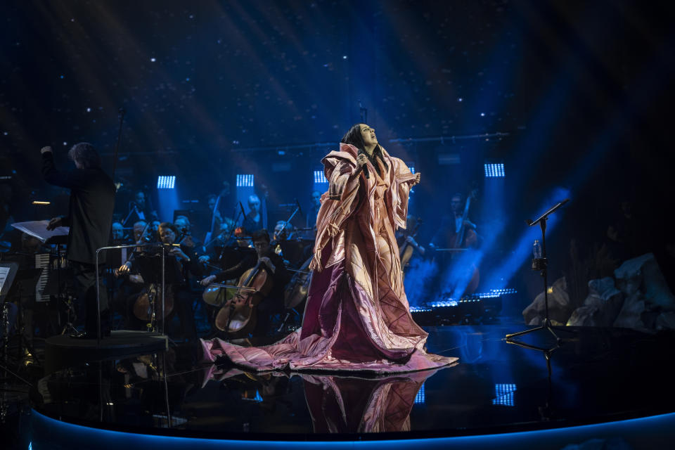Ukrainian singer Jamala sings during the final rehearsal at the National Opera in central Kyiv on Friday, May 5, 2023. Jamala won the Eurovision Song Contest in 2016 with a song about the deportation of Crimean Tatars. Fast forward to this Eurovision week and she's launching a new album, filled with more stories about her ancestors. (AP Photo/Bernat Armangue)