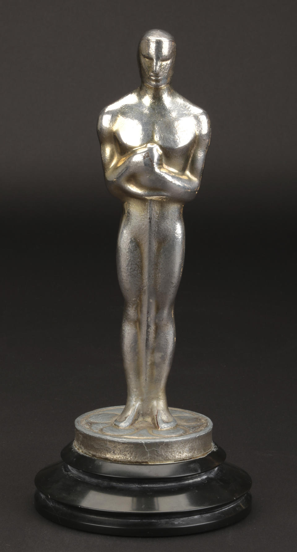 FILE - This undated file image provided by Profiles in History shows Irving Thalberg's Academy Award for best picture for "Mutiny on the Bounty." The best picture statuette for 1935's "Mutiny on the Bounty" fetched $240,000., in a rare auction of Oscars that ended Friday, Dec. 14, 2018, in Los Angeles. (Lou Bustamante/Profiles in History via AP, File)