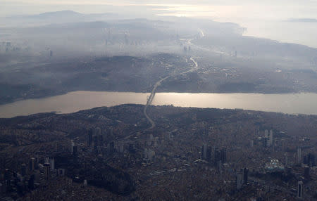 FILE PHOTO: Bosphorus strait is pictured through the window of a passenger aircraft over Istanbul, Turkey, November 12, 2016. REUTERS/Murad Sezer/File Photo