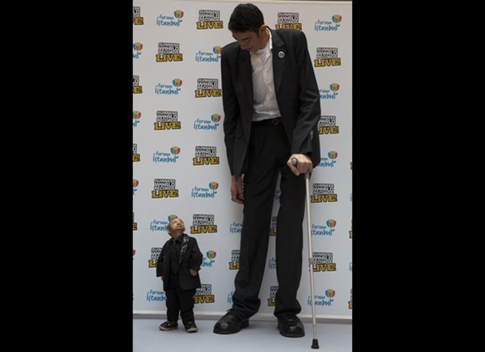 Sultan Kosen, world's tallest man, meeting the world's shortest man, He Pingping Turkey to celebrate the 15 January opening of the new Guinness World Records Live! Roadshow at Forum Istanbul.