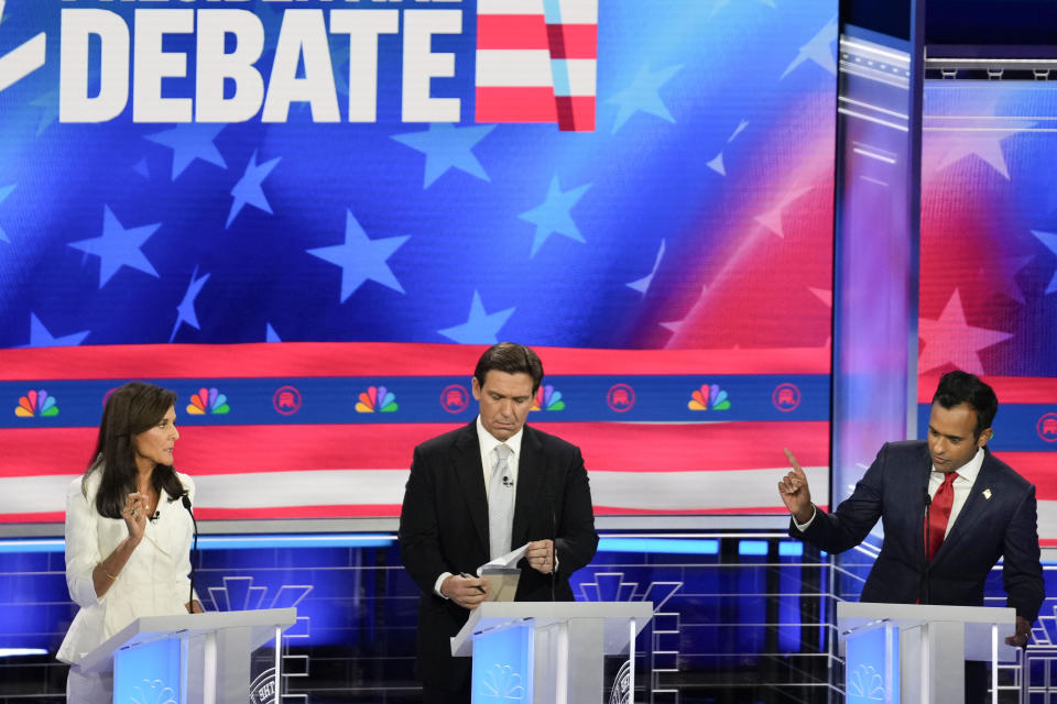 FILE - Republican presidential candidates from left, former UN Ambassador Nikki Haley, Florida Gov. Ron DeSantis, and businessman Vivek Ramaswamy, participate in a Republican presidential primary debate hosted by NBC News on Nov. 8, 2023, at the Adrienne Arsht Center for the Performing Arts of Miami-Dade County in Miami. The Republicans battling to be the alternative to former President Donald Trump are coming together for what an influential Christian organization in Iowa is billing as a friendly conversation on politics and their world views. (AP Photo/Rebecca Blackwell)