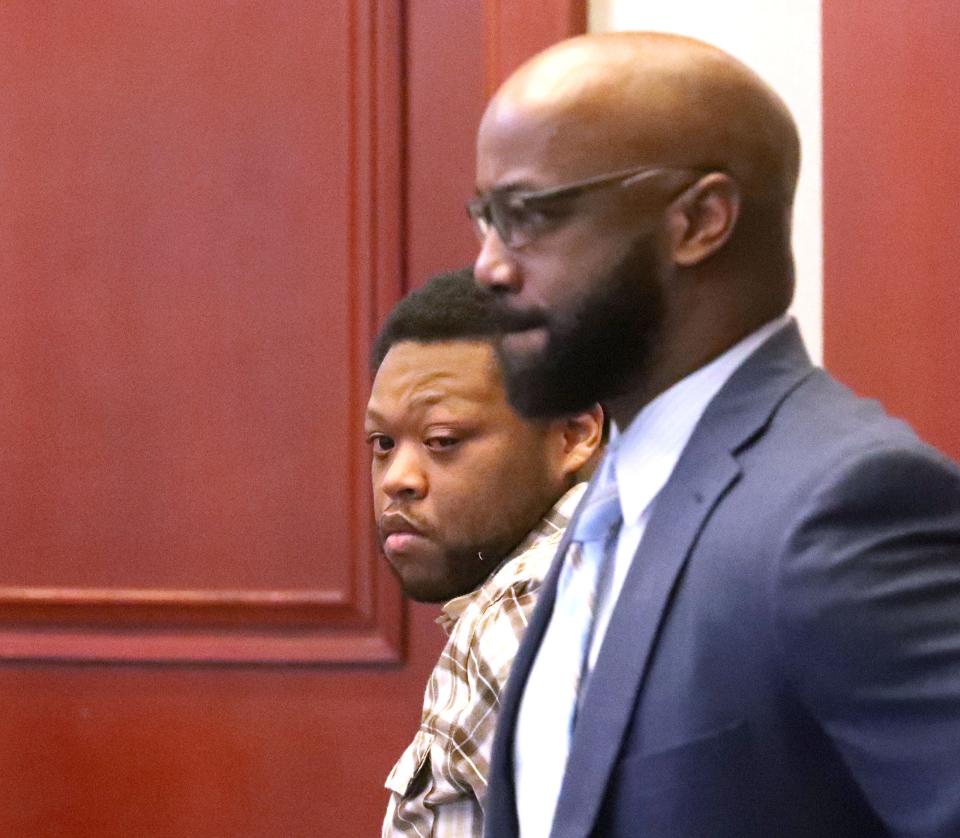 Jakari Webb stands with his attorney, Gordon Fenderson, while the jury exits the courtroom, Tuesday, April 2, 2024, as he goes on trial for the murder of Telan Mann.