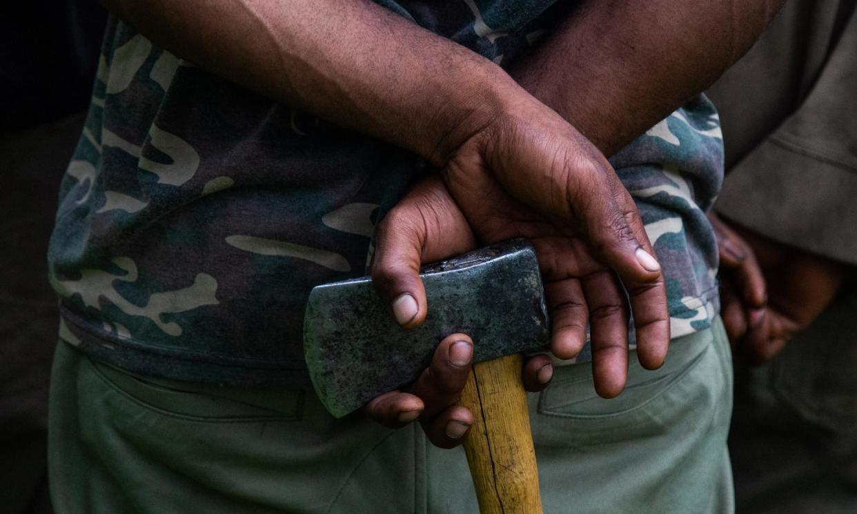 <span>At least 54 people were killed in an ambush between tribes in Papua New Guinea in the remote Akom village in Enga province on Sunday.</span><span>Photograph: Betsy Joles/Getty Images</span>