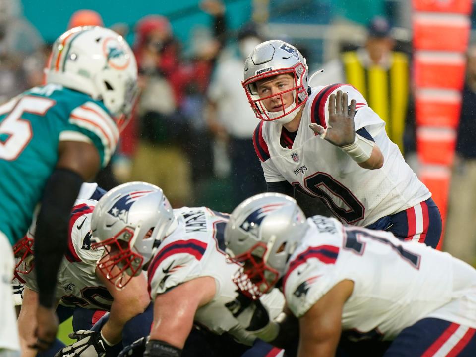 Mac Jones prepares for the snap against the Miami Dolphins.