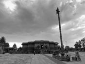 A view of the temple with the flag mast in the foreground.