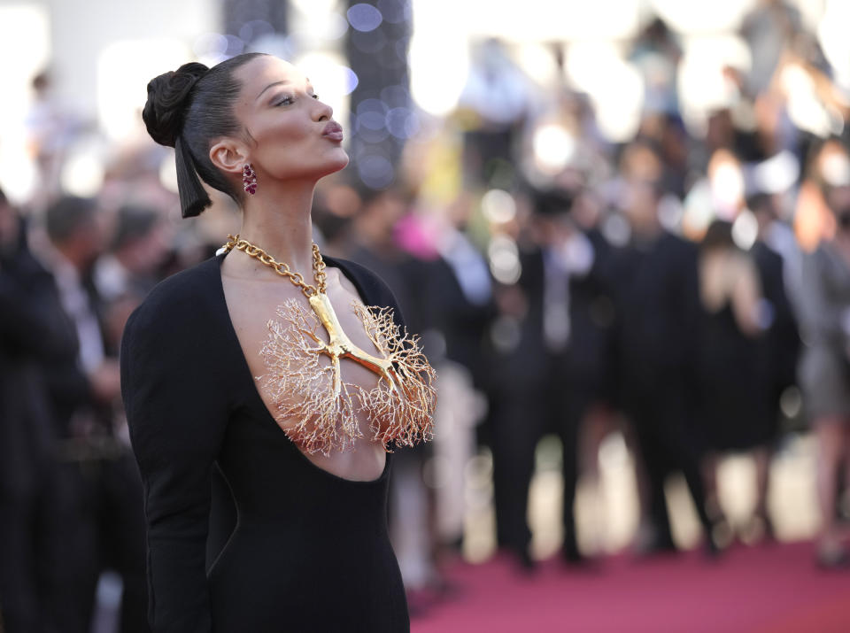 Bella Hadid poses for photographers upon arrival at the premiere of the film 'Three Floors' at the 74th international film festival, Cannes, southern France, Sunday, July 11, 2021. (AP Photo/Vadim Ghirda)