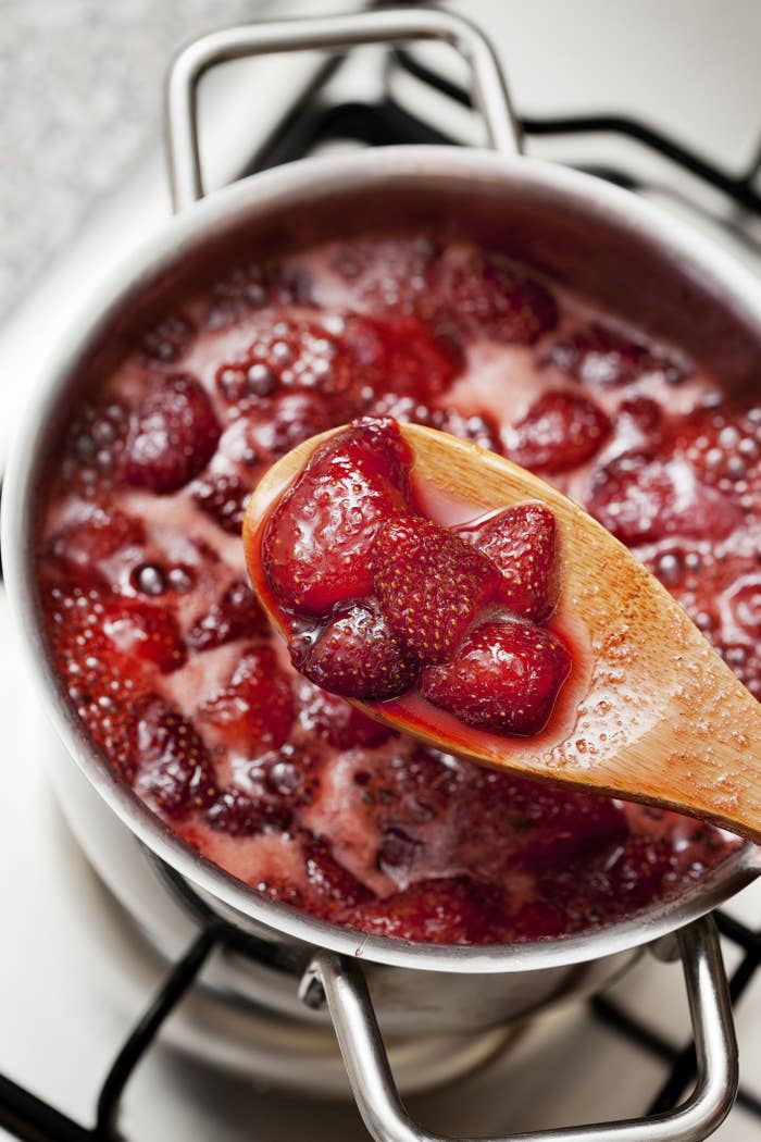 Making strawberry compote.