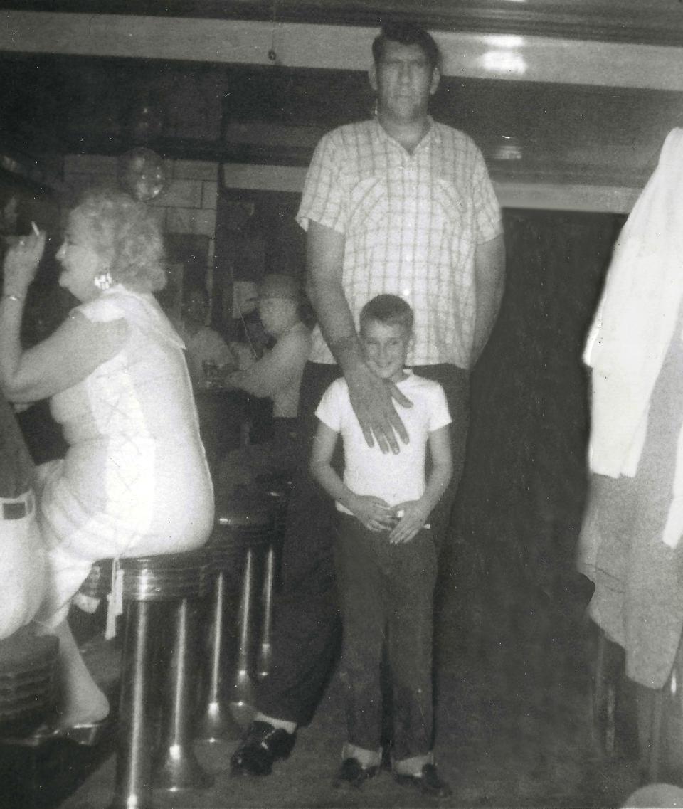 Tom Romano learned that "growing up" in a bar owned by your dad in the 1950s and 1960s introduced you to a variety of experiences, including meeting "Paul Bunyan" (Max Palmer), a professional wrestler who appeared on the card at Canton Memorial Auditorium at the time this photo was taken.