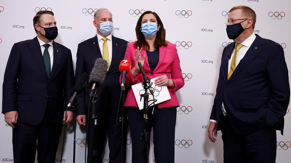 Annastacia Palaszczuk and John Coates, pictured here speaking to the media in Tokyo. 