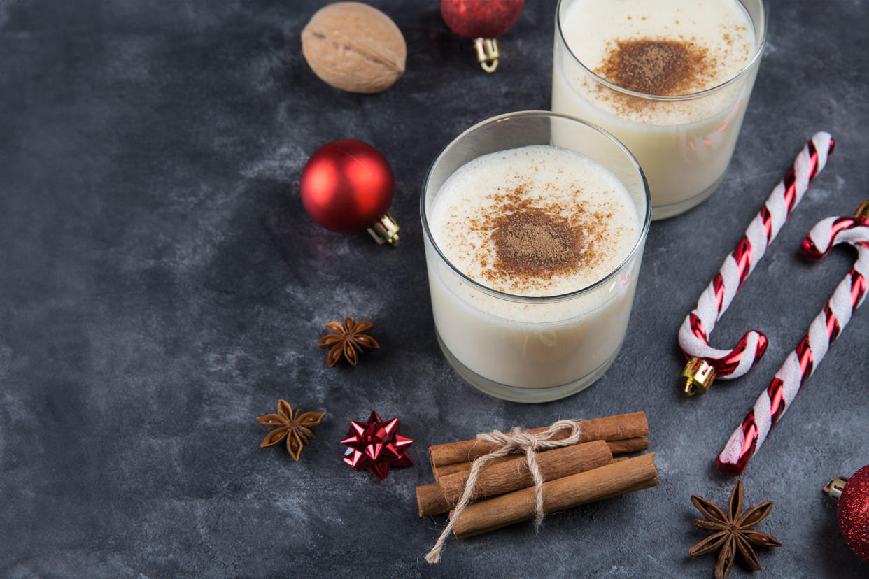 eggnog with cinnamon with christmas decorations Getty Images/Yulia Naumenko