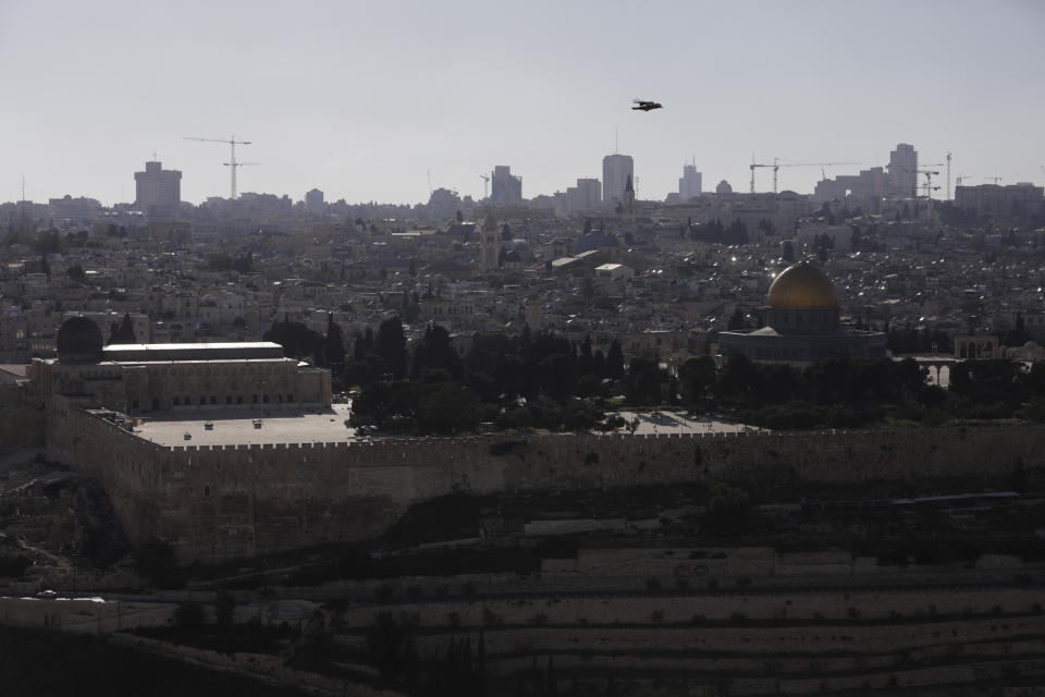 Dome of the Rock and al-Aqsa mosque compound is seen deserted as it remains shut to prevent the spread of coronavirus ahead of the Islamic holy month or Ramadan in Jerusalem, Thursday, April 23, 2020. AP Photo/Sebastian Scheiner)