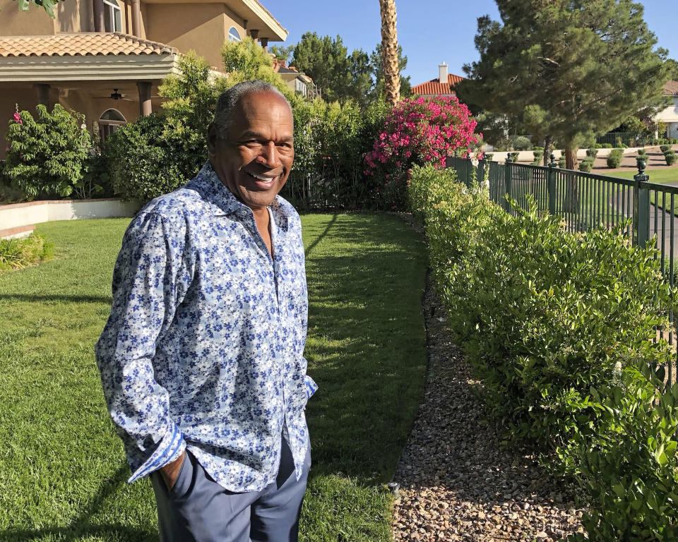 This photo provided by Didier J. Fabien shows O.J. Simpson in the garden of his Las Vegas area home on Monday, June 3, 2019. After 25 years living under the shadow of one of the nation’s most notorious murder cases, Simpson says his life now is fine. (Didier J. Fabien via AP)