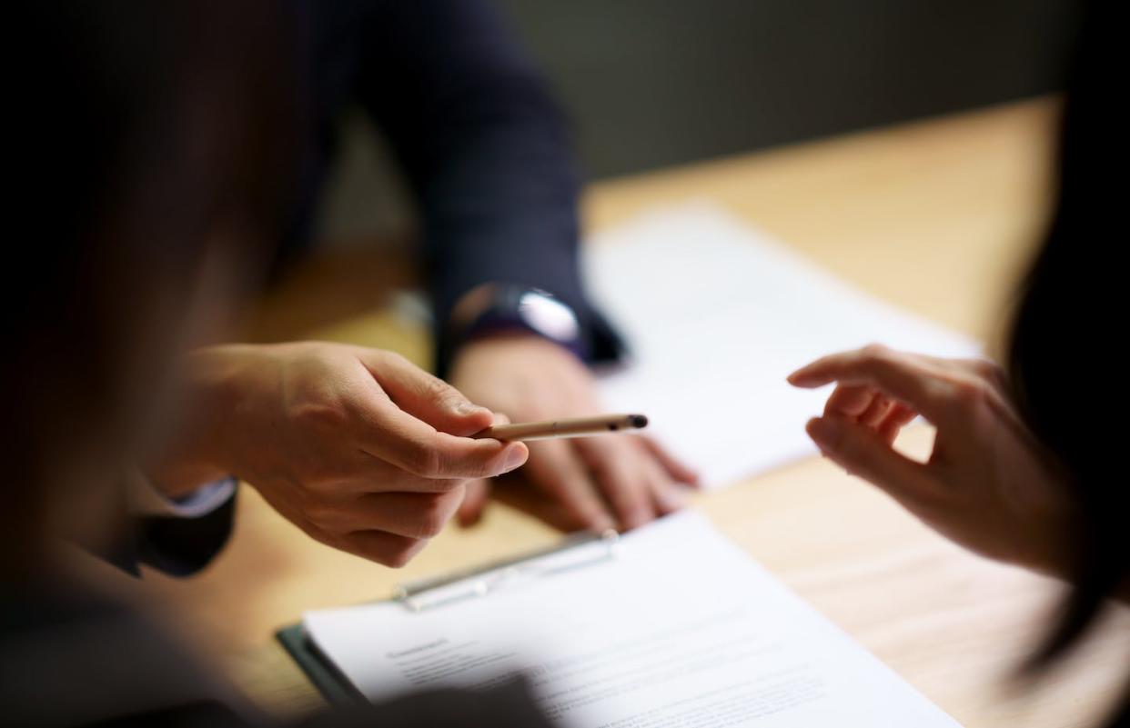 It's estimated that over one-third of all private companies require their employees to sign noncompete clauses. <a href="https://www.gettyimages.com/detail/photo/sign-contract-agreement-in-business-royalty-free-image/1221984251" rel="nofollow noopener" target="_blank" data-ylk="slk:wera Rodsawang/Moment via Getty Images;elm:context_link;itc:0;sec:content-canvas" class="link ">wera Rodsawang/Moment via Getty Images</a>