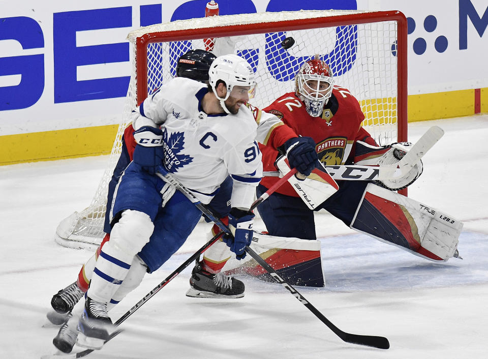 Florida Panthers goaltender Sergei Bobrovsky (72) stops the puck in front of Toronto Maple Leafs center John Tavares (91) during the second period of Game 3 of an NHL hockey Stanley Cup second-round playoff series, Sunday, May 7, 2023, in Sunrise, Fla. (AP Photo/Michael Laughlin)