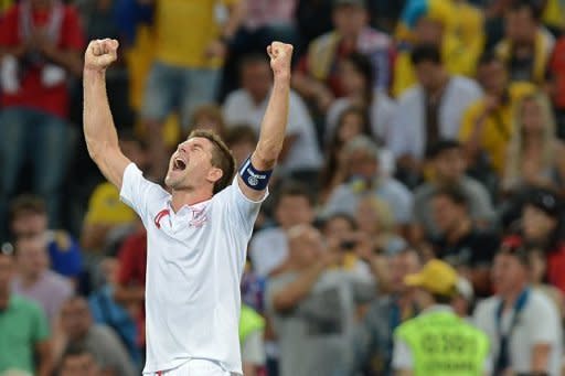 English midfielder Steven Gerrard celebrates after the Euro 2012 football championships match England vs Ukraine at the Donbass Arena in Donetsk. England scraped into the quarter-finals of Euro 2012 here Tuesday after a goal-line refereeing blunder helped them to a 1-0 win over Ukraine which sent the co-hosts crashing out