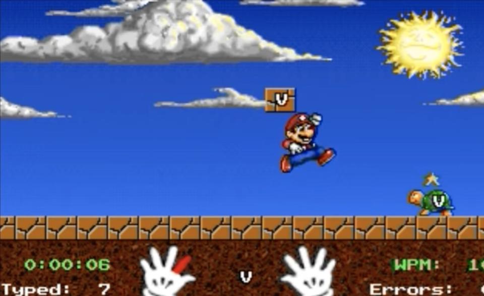 Mario jumps through a level, the player controlling him by typing the prompted letters