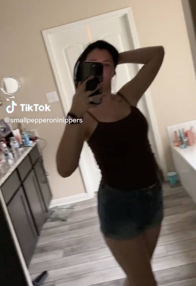 TikTok user Amy Andrews in her bathroom after flashing the camera