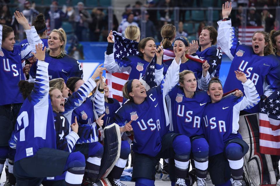 <p>The US team celebrates winning the women’s gold medal ice hockey match between the US and Canada during the Pyeongchang 2018 Winter Olympic Games at the Gangneung Hockey Centre in Gangneung on February 22, 2018. / AFP PHOTO / JUNG Yeon-Je </p>