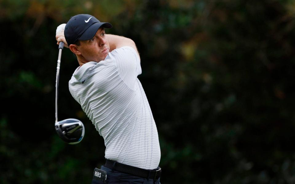  Northern Ireland's Rory McIlroy hits his tee shot on the 7th hole during the first round - Reuters