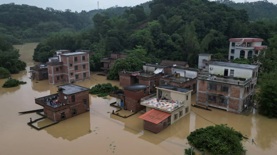 Houses submerged in floodwaters in Qingyuan, Guangdong province, on April 22, 2024. - Tingshu Wang/Reuters