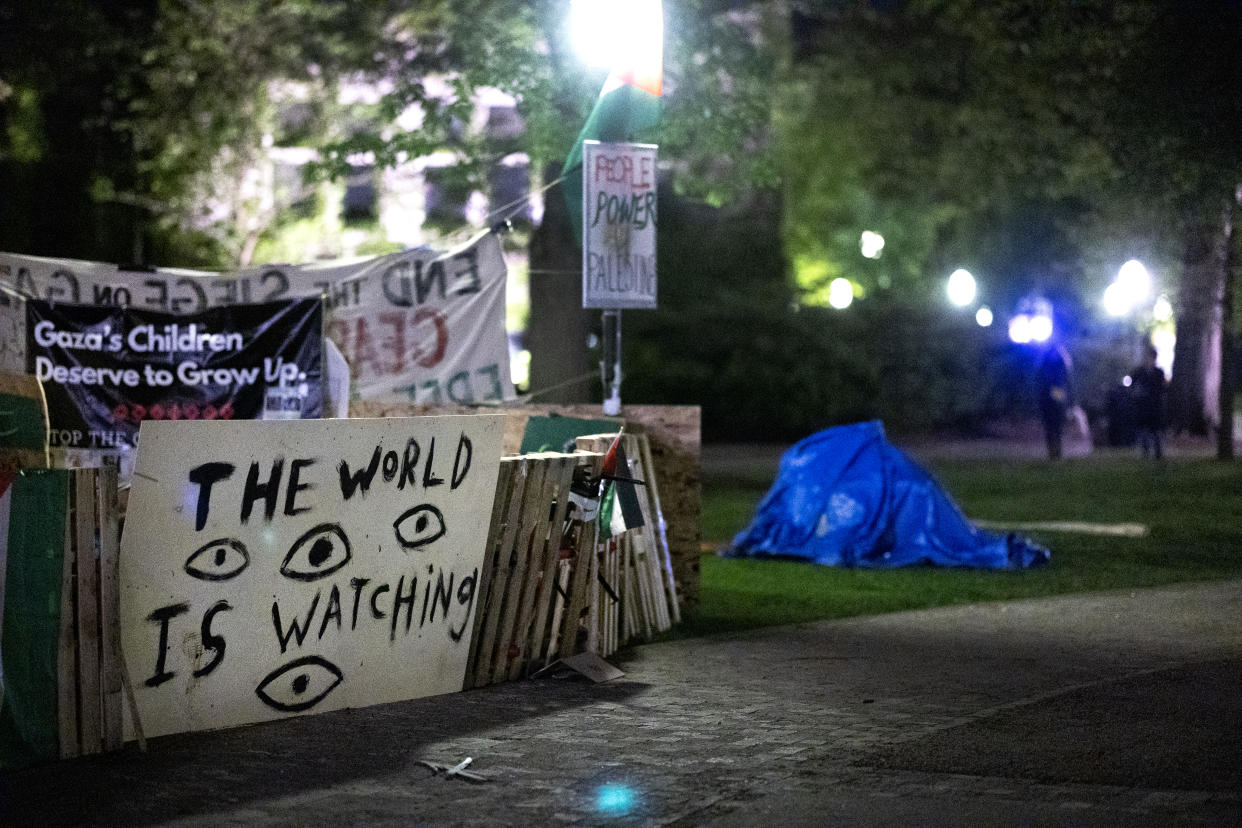 A makeshift fortification surrounds a pro-Palestinian encampment at the University of Chicago campus. 