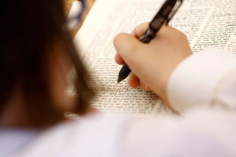 A pupil studies during a lesson at the Beis Medrash Elyon school in London