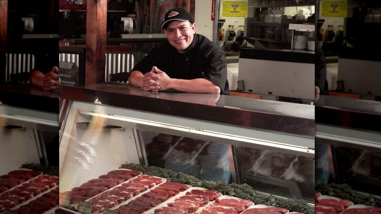 smiling texas roadhouse butcher