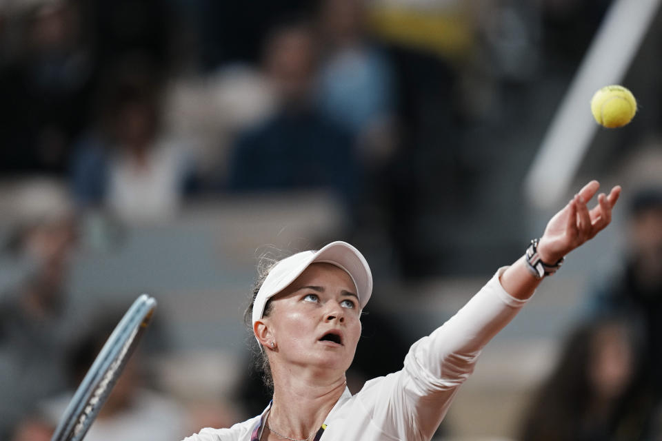 Barbora Krejcikova of the Czech Republic serves against France's Diane Parry during their first round match at the French Open tennis tournament in Roland Garros stadium in Paris, France, Monday, May 23, 2022. (AP Photo/Thibault Camus)