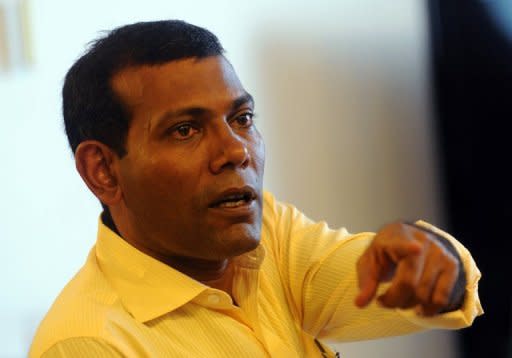 Former Maldives president Mohamed Nasheed speaks at his residence in the capital island Male on February 9. The new Maldivian government said Wednesday it would launch a probe into allegations that Nasheed was ousted from power by a military coup