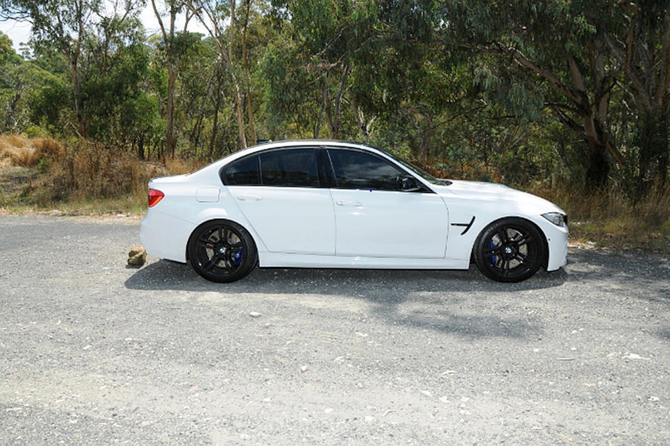 His 35-year-old’s body was discovered inside this luxury BMW by police Source: NSW Police via AAP