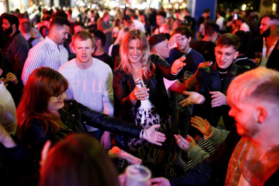 Revellers in Soho (REUTERS)