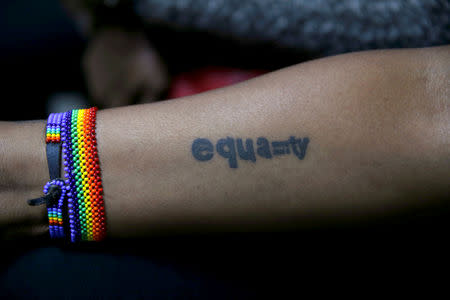 A tattoo of a LGBT activist is seen during a court hearing in the Milimani high Court in Nairobi in Nairobi, Kenya. February 22, 2019. REUTERS/Baz Ratner