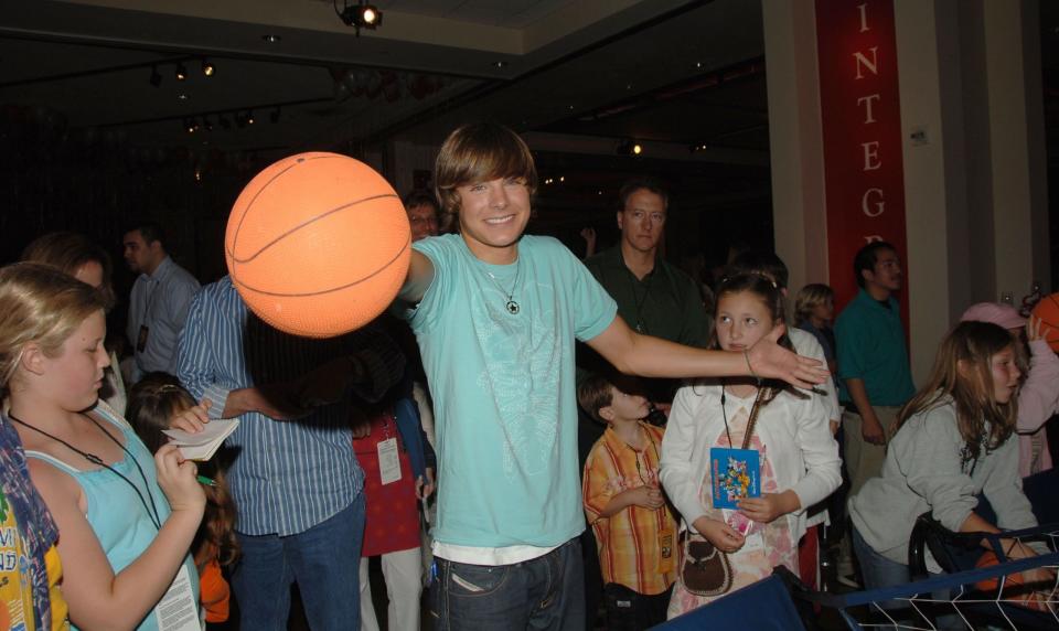 <p>In conclusion, Zac with a basketball. Bring on all the <a rel="nofollow noopener" href="https://www.youtube.com/watch?v=G--VfuI0fNs" target="_blank" data-ylk="slk:"Get'cha Head in the Game";elm:context_link;itc:0;sec:content-canvas" class="link ">"Get'cha Head in the Game"</a> memories, because that song's choreography is major.</p>