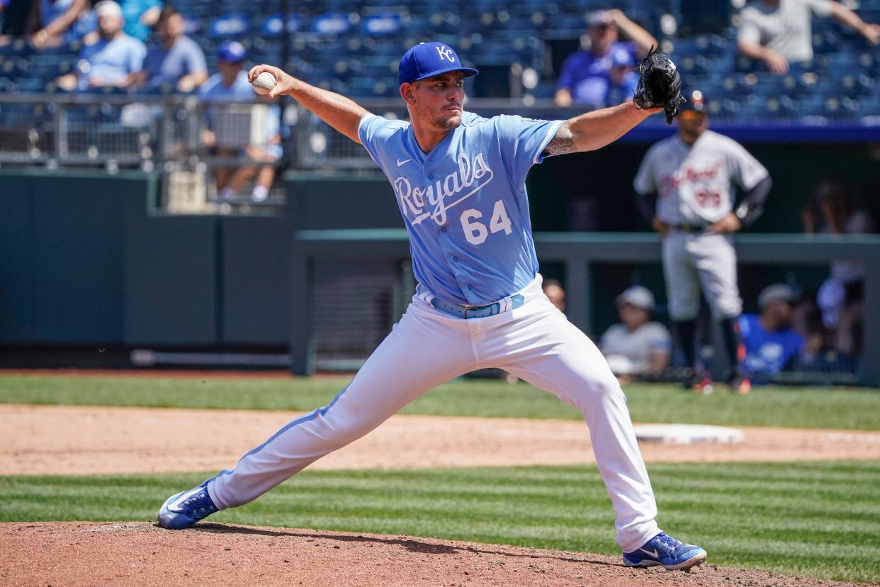 Jul 20, 2023; Kansas City, Missouri, USA; Kansas City Royals relief pitcher Nick Wittgren (64) delivers a pitch against the Detroit Tigers in the ninth inning at Kauffman Stadium. Mandatory Credit: Denny Medley-USA TODAY Sports