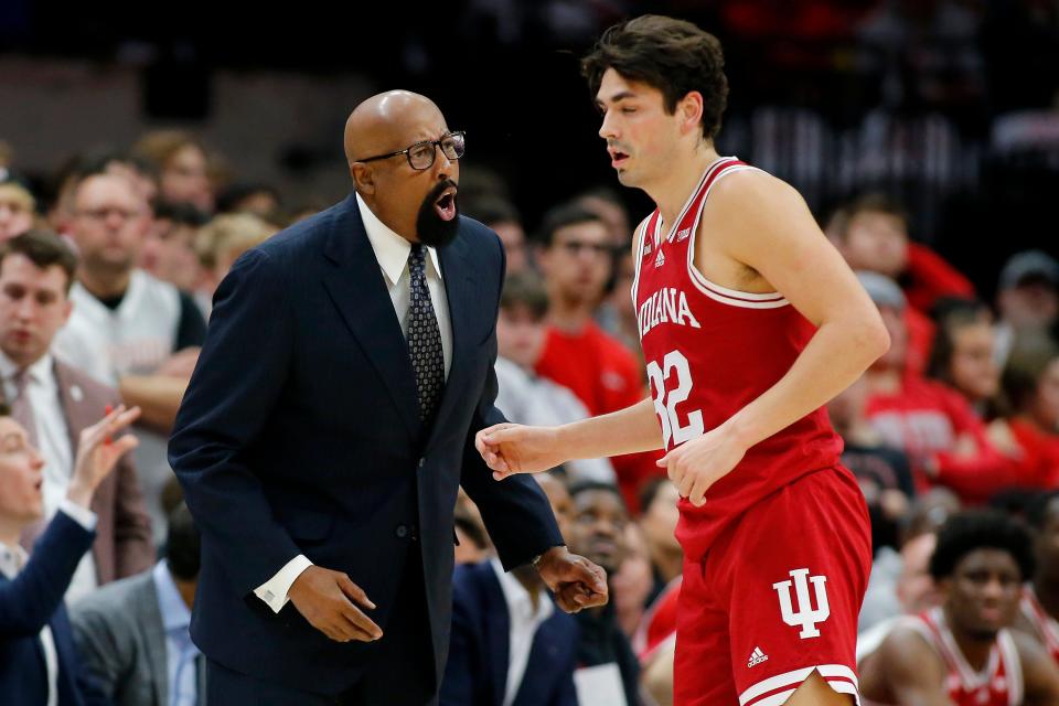 Feb 6, 2024; Columbus, Ohio, USA; Indiana Hoosiers head coach Mike Woodson has a talk with guard Trey Galloway (32) during the second half against the Ohio State Buckeyes at Value City Arena.