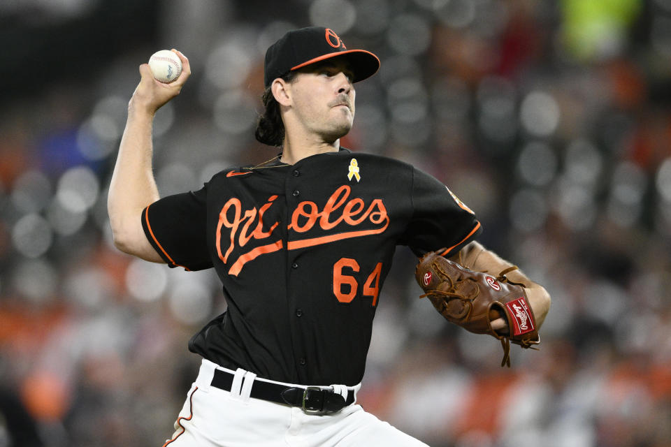 Baltimore Orioles starting pitcher Dean Kremer throws during the fifth inning of the team's baseball game against the Oakland Athletics, Friday, Sept. 2, 2022, in Baltimore. (AP Photo/Nick Wass)