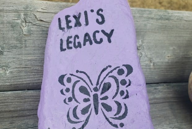 Twelve-year-old Brennah Daken painted this rock in memory of her sister. 