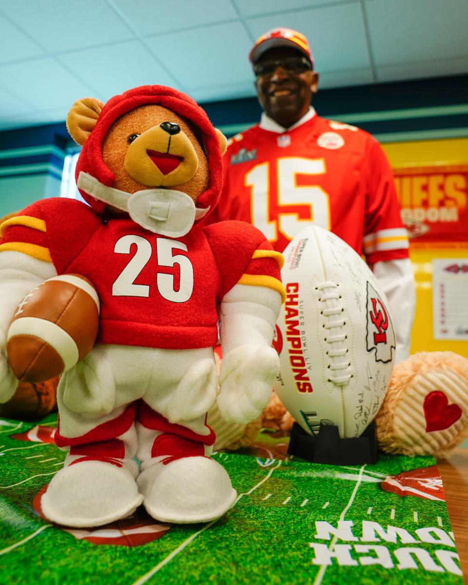 USD 501 deputy superintendent Larry Robbins displays his dancing Chiefs bear alongside a signed Super Bowl LIV football and other memorabilia Tuesday.