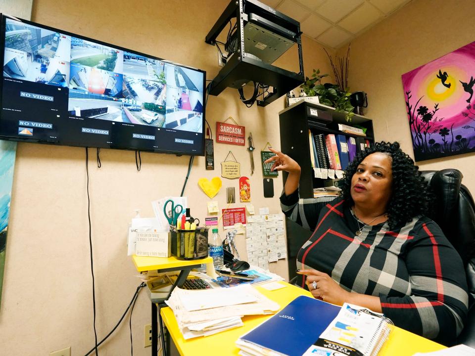 Jackson Women's Health Organization clinic director Shannon Brewer, sits under a monitor that shows all areas of the medical facility, both inside and out, Wednesday, May 19, 2021, in Jackson, Miss. Brewer expressed her concern for patients in light of the U.S. Supreme Court considering arguments later this year over a Mississippi law that would ban most abortions after 15 weeks.