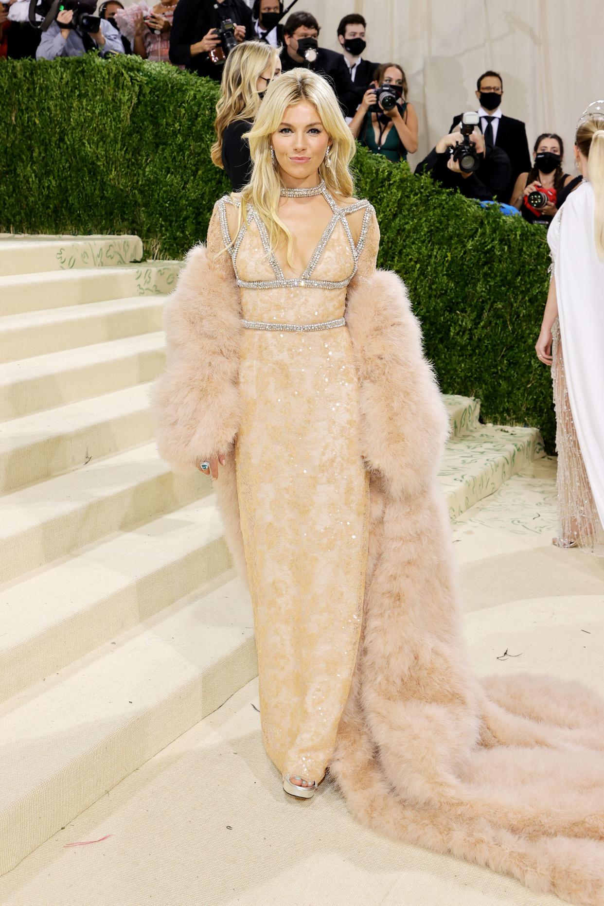 Sienna Miller attends The 2021 Met Gala Celebrating In America: A Lexicon Of Fashion at Metropolitan Museum of Art on Sept. 13, 2021 in New York.