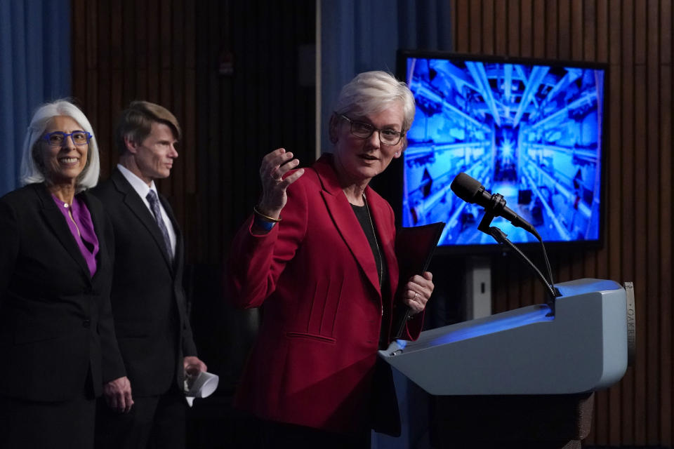 Secretary of Energy Jennifer Granholm, center, joined from left by Arati Prabhakar, the president's science adviser, and National Nuclear Security Administration Deputy Administrator for Defense Programs Marvin Adams, discusses a major scientific breakthrough in fusion research that was made at the lab in California, during a news conference at the Department of Energy in Washington, Tuesday, Dec. 13, 2022. (AP Photo/J. Scott Applewhite)