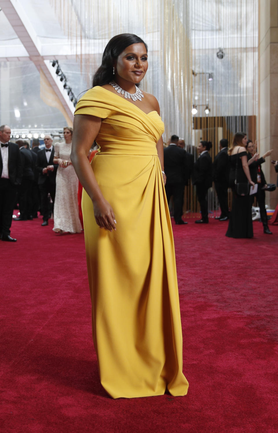 FILE - Mindy Kaling arrives at the Oscars on Feb. 9, 2020, in Los Angeles. Kaling turns 42 on June 24. (AP Photo/John Locher, File)