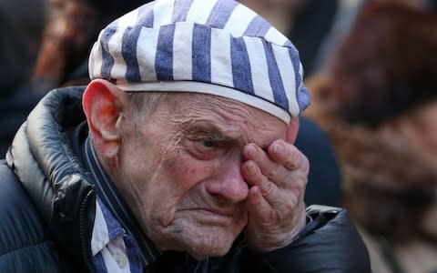 Survivors gathered at the spot where more than a million Jews were killed - Credit: Alamy Live News&nbsp;