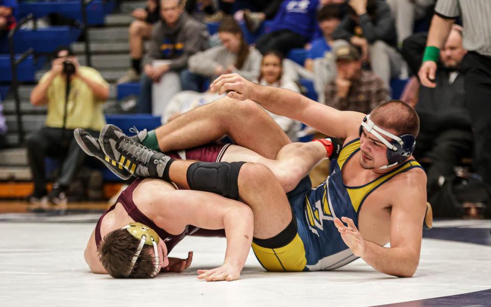 Kyle Miller (ELCO) wrestles Noah Templin (Manheim Central) in the 215-pound championship match. The Lancaster Lebanon League Wrestling Championships were held at Manheim Township on Saturday January 27, 2024.